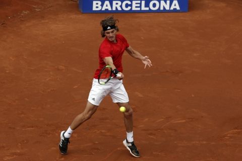 Greece's Stefanos Tsitsipas returns the ball to Spain's Rafael Nadal during the Barcelona Open Tennis Tournament final in Barcelona, Spain, Sunday, April 29, 2018. (AP Photo/Manu Fernandez)