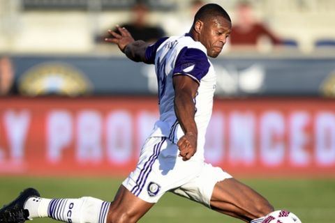 Orlando City's Julio Baptista takes a shot on goal and scores during the second half of an MLS soccer match against the Philadelphia Union on Sunday, Oct. 16, 2016, in Chester, Pa. Orlando City won 2-0. (AP Photo/Michael Perez)