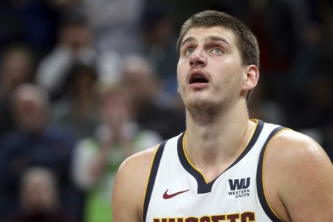 Denver Nuggets' Nikola Jokic of Serbia plays against the Minnesota Timberwolves in the second half of an NBA basketball game Wednesday, Nov. 21, 2018, in Minneapolis. (AP Photo/Jim Mone)