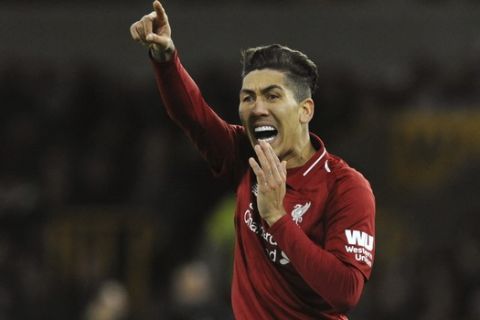 Liverpool's Roberto Firmino during the English FA Cup third round soccer match between Wolverhampton Wanderers and Liverpool at the Molineux Stadium in Wolverhampton, England, Monday, Jan. 7, 2019. (AP Photo/Rui Vieira)