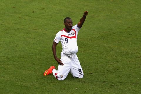 FORTALEZA, BRAZIL - JUNE 14:  Joel Campbell of Costa Rica celebrates scoring his team's first goal with the ball under his jersey during the 2014 FIFA World Cup Brazil Group D match between Uruguay and Costa Rica at Castelao on June 14, 2014 in Fortaleza, Brazil.  (Photo by Michael Steele/Getty Images)
