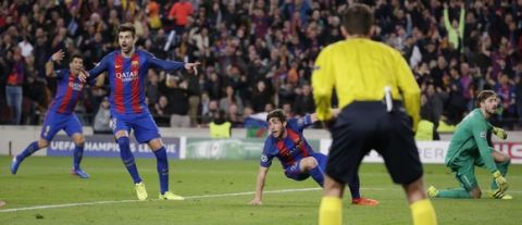 Barcelona's Sergi Robert, second from right, celebrates after scoring the sixth goal during the Champions League round of 16, second leg soccer match between FC Barcelona and Paris Saint Germain at the Camp Nou stadium in Barcelona, Spain, Wednesday March 8, 2017. Barcelona won 6-1. (AP Photo/Emilio Morenatti)
