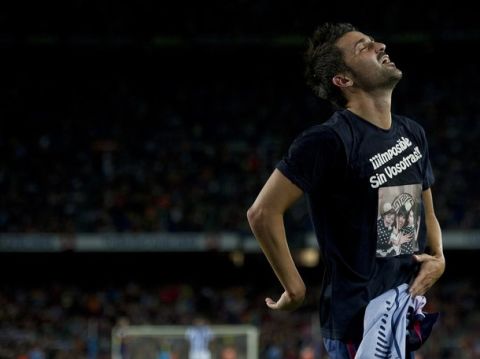 Barcelona's forward David Villa celebrates after scoring a goal during the Spanish League football match between FC Barcelona and Real Sociedad at the Camp Nou stadium in Barcelona on August 19, 2012. AFP PHOTO/ JOSEP LAGO        (Photo credit should read JOSEP LAGO/AFP/GettyImages)