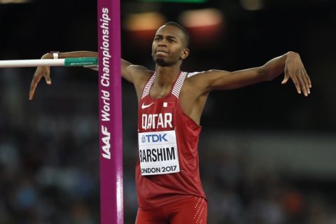 Qatar's Mutaz Essa Barshim celebrates making a clearance in the men's high jump final during the World Athletics Championships in London Sunday, Aug. 13, 2017. (AP Photo/Kirsty Wigglesworth)