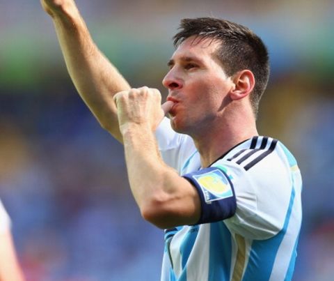 BELO HORIZONTE, BRAZIL - JUNE 21: Lionel Messi of Argentina celebrates scoring his team's first goal during the 2014 FIFA World Cup Brazil Group F match between Argentina and Iran at Estadio Mineirao on June 21, 2014 in Belo Horizonte, Brazil.  (Photo by Ronald Martinez/Getty Images)