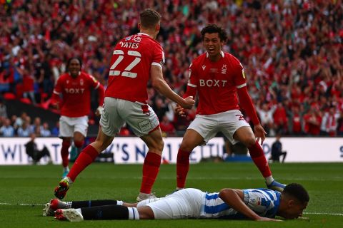 Huddersfield Town's English defender Levi Colwill reacts on the pitch after scoring an own goal during the English Championship play-off final football match between Huddersfield Town and Nottingham Forest at Wembley Stadium in London, on May 29, 2022. (Photo by Adrian DENNIS / AFP) / NOT FOR MARKETING OR ADVERTISING USE / RESTRICTED TO EDITORIAL USE  - NOT FOR MARKETING OR ADVERTISING USE / RESTRICTED TO EDITORIAL USE