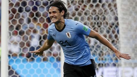 Uruguay's Edinson Cavani celebrates after he scored the opening goal during the round of 16 match between Uruguay and Portugal at the 2018 soccer World Cup at the Fisht Stadium in Sochi, Russia, Saturday, June 30, 2018. (AP Photo/Francisco Seco)