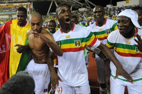 Malian national football team's players celebrate their victory over Gabon at the end of their Africa Cup of Nations (CAN 2012) quarter-final football match Gabon vs Mali on February 5, 2012 at the Stade de l'Amitie in Libreville. Mali won 5-4 after extra-time and penalties.   AFP PHOTO/ FRANCK FIFE (Photo credit should read FRANCK FIFE/AFP/Getty Images)