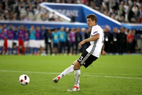 Germany's Thomas Muller sees is penalty saved by Italy goalkeeper Gianluigi Buffon in the shoot-out 