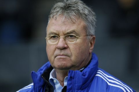 Chelsea's manager until the end of the season Guus Hiddink is seen before the English FA Cup fourth round soccer match between Milton Keynes Dons and Chelsea at Stadium mk in Milton Keynes, England, Sunday, Jan. 31, 2016. (AP Photo/Kirsty Wigglesworth)  