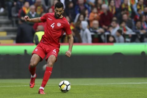 Tunisia's Yassine Meriah controls the ball during a friendly soccer match between Portugal and Tunisia in Braga, Portugal, Monday, May 28, 2018. (AP Photo/Armando Franca)