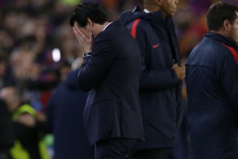 PSG head coach Unai Emery reacts at the end of the Champions League round of 16, second leg soccer match between FC Barcelona and Paris Saint Germain at the Camp Nou stadium in Barcelona, Spain, Wednesday March 8, 2017. Barcelona won the match 6-1 (6-5 on aggregate). (AP Photo/Manu Fernandez)