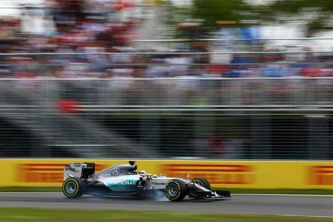 MONTREAL, QC - JUNE 07:  Lewis Hamilton of Great Britain and Mercedes GP drives during the Canadian Formula One Grand Prix at Circuit Gilles Villeneuve on June 7, 2015 in Montreal, Canada.  (Photo by Clive Mason/Getty Images)