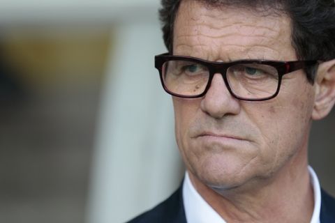 FILE - In this June  14, 2015 file photo, Russias coach Fabio Capello watches his players during the Euro 2016 qualifying soccer match between Russia and Austria, in Moscow, Russia. The Russian Football Union says national team coach Capello has resigned following a dispute over back pay. In a statement released Monday, July 13, 2015, the Russian Football Union did not disclose the financial terms of the settlement but expressed gratitude to Capello for his work. (AP Photo/Ivan Sekretarev, file)