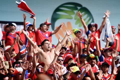RECIFE, BRAZIL - JUNE 20: Costa Rica fans celebrate a 1-0 victory over Italy in the 2014 FIFA World Cup Brazil Group D match between Italy and Costa Rica at Arena Pernambuco   on June 20, 2014 in Recife, Brazil.  (Photo by Laurence Griffiths/Getty Images)