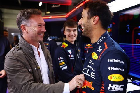 NORTHAMPTON, ENGLAND - JULY 11:  Daniel Ricciardo of Australia and Oracle Red Bull Racing speaks with Red Bull Racing Team Principal Christian Horner as he prepares to drive during Formula 1 testing at Silverstone Circuit on July 11, 2023 in Northampton, England. (Photo by Mark Thompson/Getty Images)