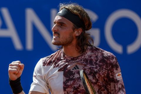 Stefanos Tsitsipas, of Greece, celebrates his victory over Lorenzo Musetti, of Italy, during a semi final open tennis tournament, in Barcelona, Spain, Saturday, April 22, 2023. (AP Photo/Joan Monfort)