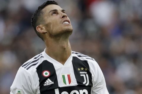 Juventus' Cristiano Ronaldo looks to the sky as he reacts during the Serie A soccer match between Juventus and Lazio at the Allianz Stadium in Turin, Italy, Saturday, Aug. 25, 2018. (AP Photo/Luca Bruno)