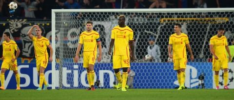 BASEL, SWITZERLAND - OCTOBER 01:  Dejected Steven Gerrard and Mario Balotelli of Liverpool after conceding the first goal during the UEFA Champions League Group B match between FC Basel 1893 and Liverpool FC at St. Jakob Stadium on October 1, 2014 in Basel, Switzerland.  (Photo by Jamie McDonald/Getty Images)