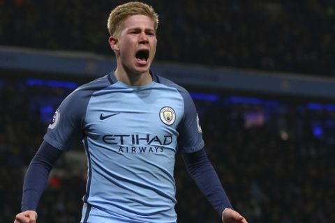 Manchester City's Kevin De Bruyne celebrates after scoring his sides 2nd goal of the game during the English Premier League soccer match between Manchester City and Tottenham Hotspur at the Etihad stadium in Manchester, England, Saturday, Jan., 21, 2017. (AP Photo/Dave Thompson)