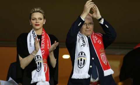 Prince Albert II of Monaco attends with his wife Princess Charlene a Champions League semifinal first leg soccer match between Monaco and Juventus at the Louis II stadium in Monaco, Wednesday, May 3, 2017. (AP Photo/Claude Paris)