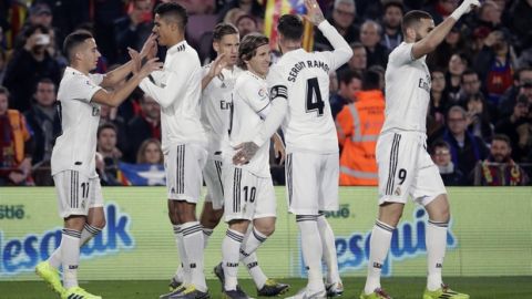 Real players celebrate scoring their side's first goal during the Copa del Rey semifinal first leg soccer match between FC Barcelona and Real Madrid at the Camp Nou stadium in Barcelona, Spain, Wednesday Feb. 6, 2019. (AP Photo/Emilio Morenatti)