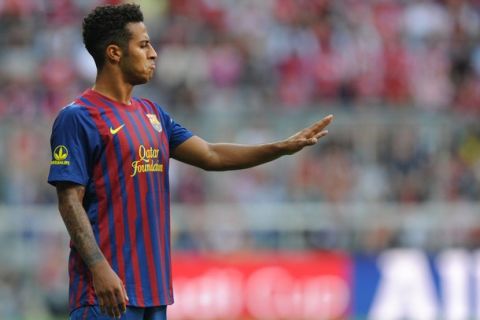 Barcelona's midfielder Thiago Alcantara gestures during their Audi Cup football match FC Barcelona vs SC International de Porto Alegre in Munich, southern Germany, on July 26, 2011. Barcelona won 4-2 on a penalty shoot-out, after a 2-2 draw.    AFP PHOTO / CHRISTOF STACHE (Photo credit should read CHRISTOF STACHE/AFP/Getty Images)