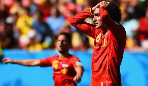 BRASILIA, DF - JULY 05: Marouane Fellaini of Belgium reacts during the 2014 FIFA World Cup Brazil Quarter Final match between Argentina and Belgium at Estadio Nacional on July 5, 2014 in Brasilia, Brazil.  (Photo by Matthias Hangst/Getty Images)