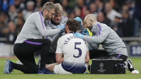 Tottenham's Jan Vertonghen is treated for a head wound during the Champions League semifinal first leg soccer match between Tottenham Hotspur and Ajax at the Tottenham Hotspur stadium in London, Tuesday, April 30, 2019. (AP Photo/Frank Augstein)