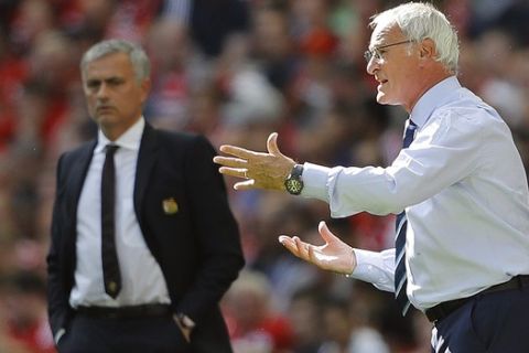 Leicester's Team Manager Claudio Ranieri, right, and Manchester United's Tema Manager Jose Mourinho react during the Community Shield soccer match between Leicester and Manchester United at Wembley stadium in London, Sunday, Aug. 7, 2016 . (AP Photo/Frank Augstein)