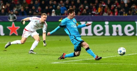 LEVERKUSEN, GERMANY - DECEMBER 09:  Lionel Messi of Barcelona scores the first Barcelona goal during the UEFA Champions League Group E match between Bayer 04 Leverkusen and FC Barcelona at BayArena on December 9, 2015 in Leverkusen, Germany.  (Photo by Alex Grimm/Bongarts/Getty Images)