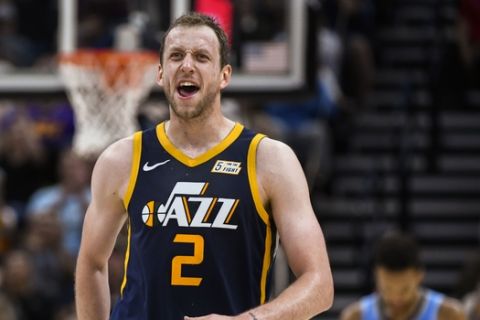 Utah Jazz forward Joe Ingles celebrates a play during the first half of the team's NBA basketball game against the Memphis Grizzlies on Friday, Nov. 2, 2018, in Salt Lake City. (AP Photo/Alex Goodlett)