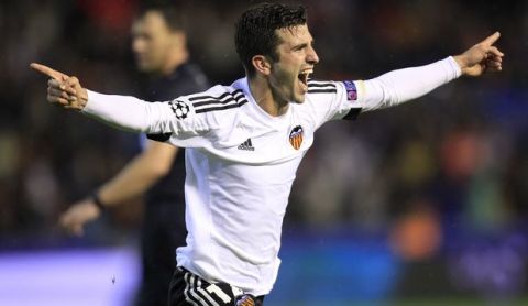 Valencia's Jose Gaya celebrates after scoring against Gent during a Group H Champions League soccer match at the Mestalla stadium in Valencia, Spain, Tuesday Oct. 20, 2015. (AP Photo/Alberto Saiz)