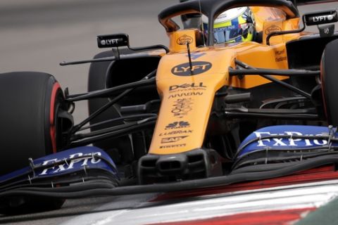 Mclaren driver Lando Norris of Britain steers his car during the first free practice at the 'Sochi Autodrom' Formula One circuit, in Sochi, Russia, Friday, Sept. 27, 2019. The Formula one race will be held on Sunday. (AP Photo/Luca Bruno)