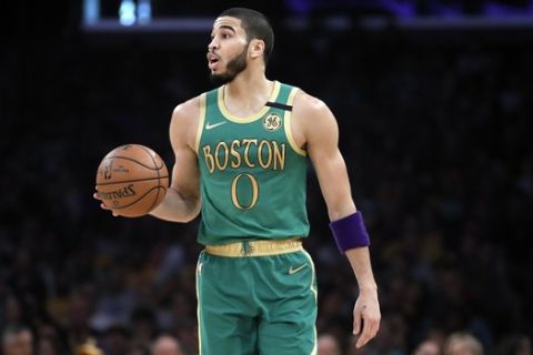 Boston Celtics' Jayson Tatum (0) during the first half of an NBA basketball game against the Los Angeles Lakers Sunday, Feb. 23, 2020, in Los Angeles. (AP Photo/Marcio Jose Sanchez)