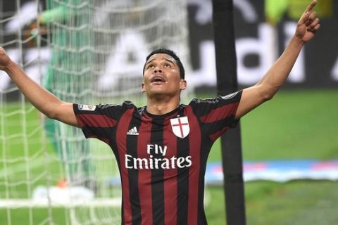 Milan's forward Bacca celebrates after scoring the 2-0 goal during the Italian Serie A soccer match Ac Milan vs Fc Internazionale at the Giuseppe Meazza stadium in Milan, 31 January 2016. ANSA/ DANIEL DAL ZENNARO
