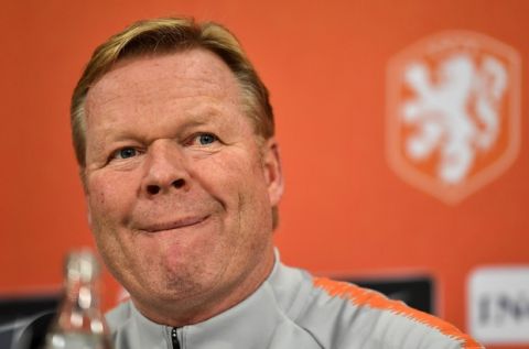 Netherland's head coach Ronald Koeman listens to the media at a press conference prior the UEFA Nations League soccer match between Germany and The Netherlands, in Gelsenkirchen, Sunday, Nov. 18, 2018. (AP Photo/Martin Meissner)