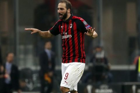 AC Milan's Gonzalo Higuain reacts during the Europa League, Group F soccer match between AC Milan and Betis, at the San Siro Stadium in Milan, Italy, Thursday, Oct. 25, 2018. (AP Photo/Antonio Calanni)