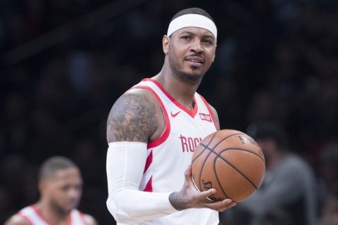 Houston Rockets forward Carmelo Anthony reacts during the second half of an NBA basketball game against the Brooklyn Nets, Friday, Nov. 2, 2018, in New York. The Rockets won 119-111. (AP Photo/Mary Altaffer)
