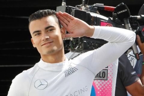 Manor driver Pascal Wehrlein of Germany, gestures as he arrives at the pits prior to the start of the third free practice at the Monaco racetrack, in Monaco, Saturday, May 28 2016. The Formula one race will be held on Sunday. (AP Photo/Claude Paris)
