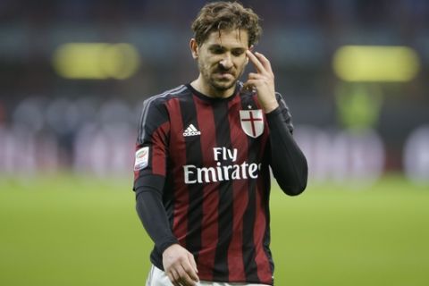 AC Milan's Alessio Cerci grimaces at the end of a Serie A soccer match between AC Milan and Bologna, at the San Siro stadium in Milan, Italy, Wednesday Jan. 6, 2016. Bologna won 1-0. (AP Photo/Luca Bruno)