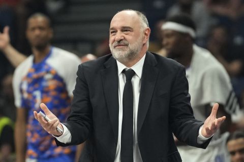 Real Madrid's head coach Pablo Laso gestures during a Final Four Euroleague semifinal basketball match between Barcelona and Real Madrid, in Belgrade, Serbia, Thursday, May 19, 2022. (AP Photo/Darko Vojinovic)