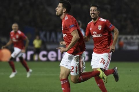 Benfica's Pizzi, center, celebrates with teammates his sides second goal against PAOK during the Champions League playoffs, second leg, soccer match between PAOK and Benfica at theToumba stadium in the northern Greek port city of Thessaloniki, on Wednesday, Aug. 29, 2018. (AP Photo/Giannis Papanikos)