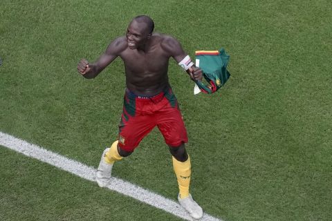 Cameroon's Vincent Aboubakar celebrates after scoring the opening goal during the World Cup group G soccer match between Cameroon and Brazil, at the Lusail Stadium in Lusail, Qatar, Friday, Dec. 2, 2022. (AP Photo/Thanassis Stavrakis)