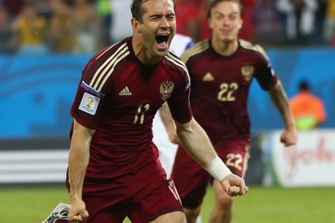 CUIABA, BRAZIL - JUNE 17:  Aleksandr Kerzhakov of Russia celebrates scoring his team's first goal during the 2014 FIFA World Cup Brazil Group H match between Russia and South Korea at Arena Pantanal on June 17, 2014 in Cuiaba, Brazil.  (Photo by Elsa/Getty Images)