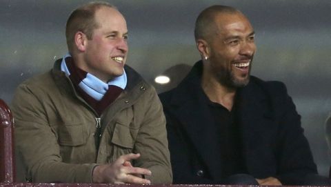 Britain's Prince William and former Norwegian international soccer player John Carew watch in an executive box during the English Championship soccer match between Aston Villa and Cardiff at Villa Park, Birmingham, England, Tuesday April 10, 2018. (Paul Harding/PA via AP)