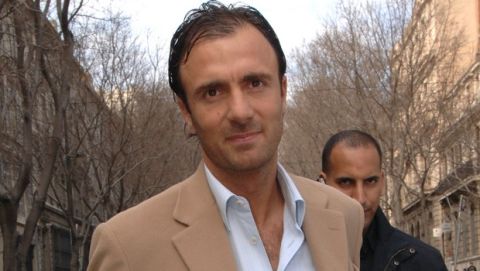 Former Olympique Marseille soccer player Christophe Dugarry leaves Marseille Law Courts, Wednesday, March 22, 2006. Fourteen people, including former coach Rolland Courbis and the club's main shareholder Robert Louis-Dreyfus, have been cited on embezzlement and bribery charges in a trial expected to last until March 31. The trial will try to establish if Louis-Dreyfus, Courbis and several other former club officials were guilty of illegal payments in the transfers of 15 players between 1997 and 1999. (AP Photo/Claude Paris)