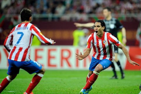 Atletico Madrid's Colombian forward Radamel Falcao (R) celebrates after scoring a goal during the UEFA Europa League final football match between Club Atletico Madrid and Athletic Club Bilbao on May 9, 2012 at the National Arena stadium in Bucharest. AFP PHOTO / RAFA RIVASRAFA RIVAS/AFP/GettyImages