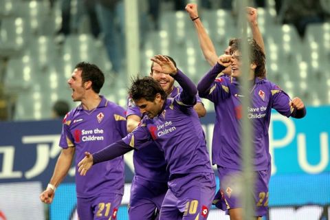 FLORENCE, ITALY - DECEMBER 05: Adrian Mutu of ACF Fiorentina celebrates after scoring a goal during the Serie A match between Fiorentina and Cagliari at Stadio Artemio Franchi on December 5, 2010 in Florence, Italy.  (Photo by Gabriele Maltinti/Getty Images)