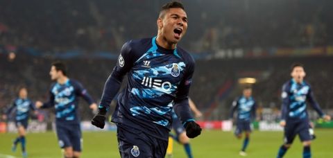 Porto's Brazilian midfielder Casemiro jubilates after scoring an equalizer that was later not allowed by the referee for offside positions, during the UEFA Champions League round of 16 first leg football match between Basel (FCB) and Porto (FCP) on February 18, 2015 at the St. Jakob-Park stadium in Basel.  AFP PHOTO / FABRICE COFFRINI        (Photo credit should read FABRICE COFFRINI/AFP/Getty Images)